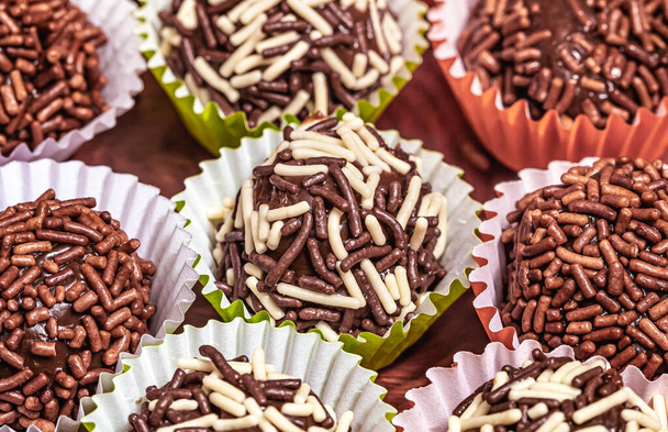 Chocolate truffles or brigadeiro typical Brazilian sweet. Most traditional sweet of birthday parties. - Photo, image