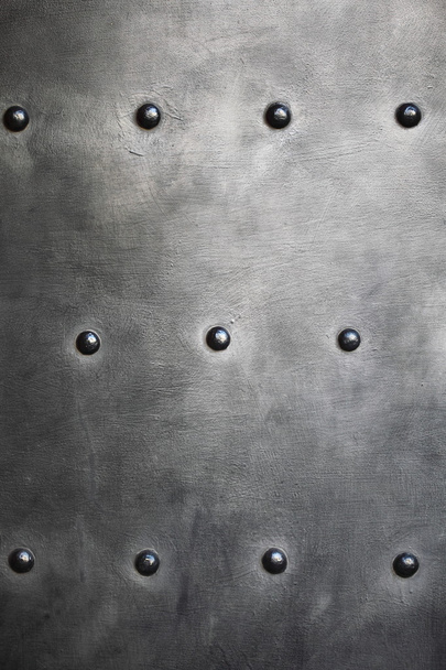 Black metal plate or armour texture with rivets - Fotó, kép