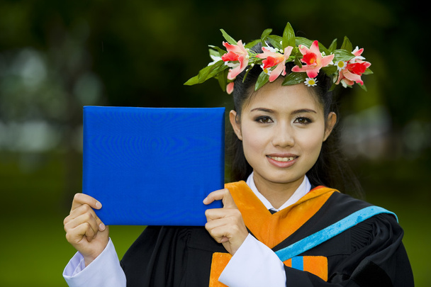 Asiática estudiante en su graduación día
 - Foto, Imagen