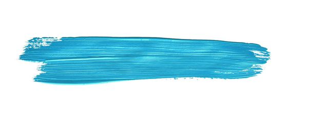 Turkoois blauwe penseelstreek schilferend over geïsoleerde achtergrond, canvas aquareltextuur - Foto, afbeelding