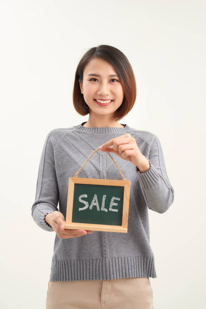 excited happy beautiful young woman with sale sign isolated over white - Photo, Image