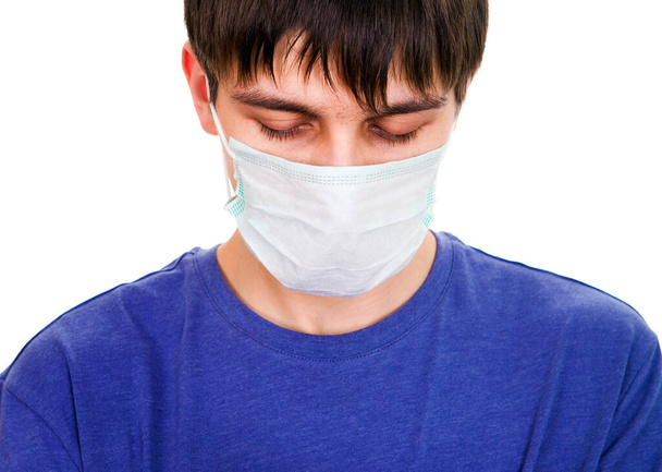 Sad Young Man in Flu Mask Isolated on the White Background - Photo, image