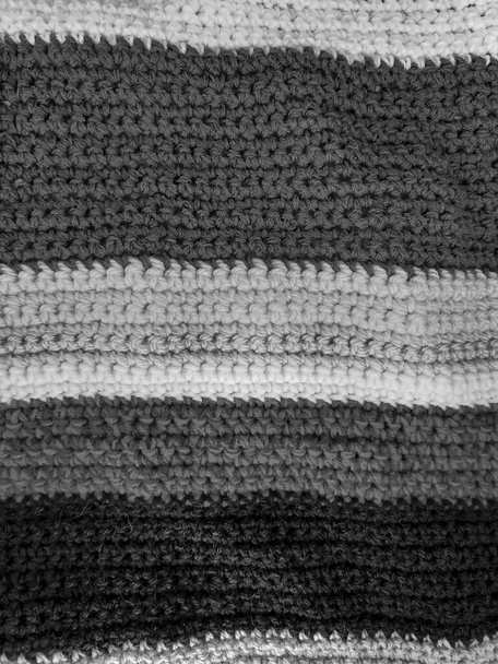 Black white knitted stripes background. - Photo, Image