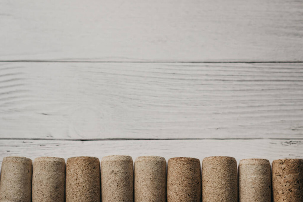wine corks on wooden background - Фото, изображение