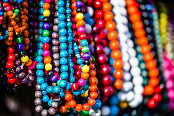 Wooden colored beads on display on the market in Zakopane, Poland - Photo, Image
