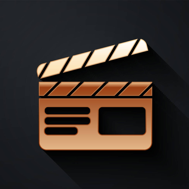 Gold Movie clapper icon isolated on black background. Film clapper board. Clapperboard sign. Cinema production or media industry. Long shadow style. Vector Illustration - Vector, Image