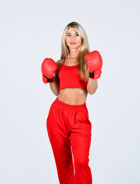 fight for success. knockout and energy. Sport success. Boxer girl workout, healthy fitness. Sport and sportswear fashion. girl in boxing gloves punching. training with coach. Working core muscles - Photo, image