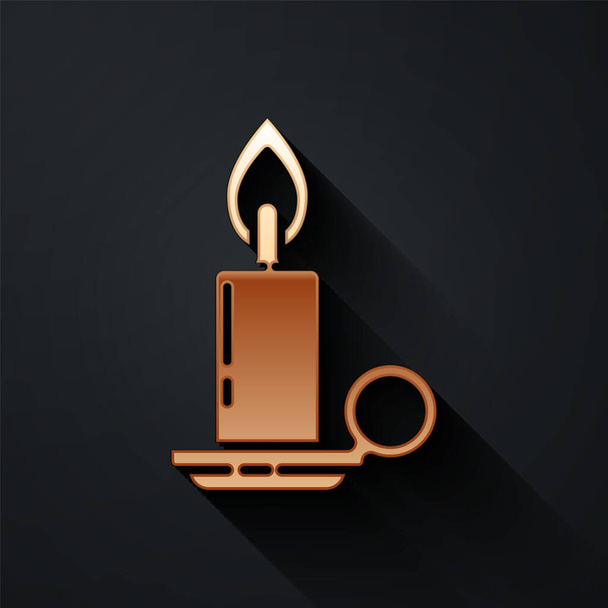 Gold Burning candle in candlestick icon isolated on black background. Cylindrical candle stick with burning flame. Long shadow style. Vector Illustration - Vector, Image