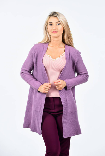 Autumn style. female fashion style. pretty woman with long blonde hair. sexy girl wear purple cardigan. beauty and fashion concept. beauty of woman isolated on white. cozy casual style - Фото, изображение