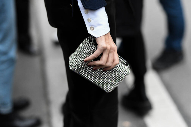 Paris, France - February 28, 2020: Silver clutch bag with diamonds - streetstylefw2020 - Foto, Bild