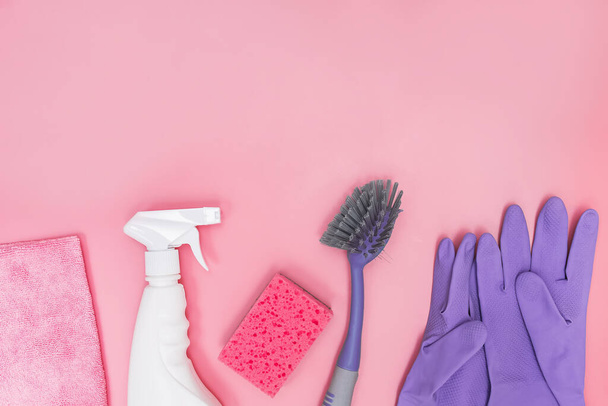 Cleaning tools and supplies on pink background - 写真・画像