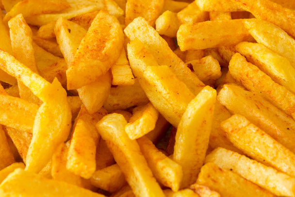 Yummy french fries as background. Flat lay, top view - Photo, Image
