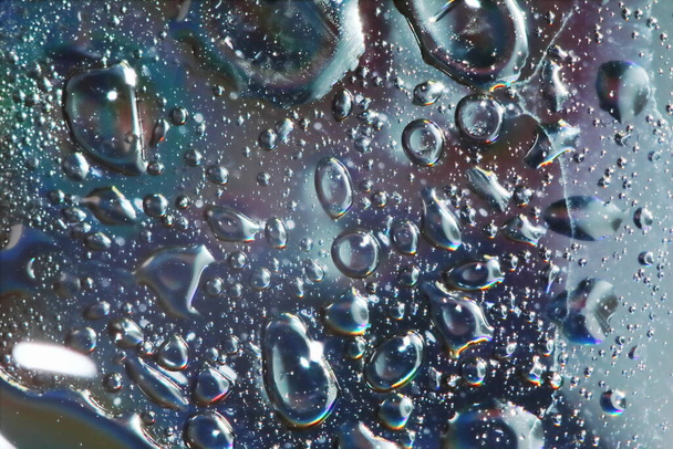 mooie olie en water met kleur voor mooie en abstracte achtergrond - Foto, afbeelding