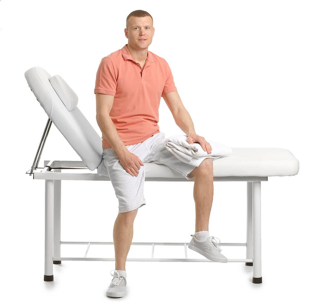 Ritratto di massaggiatore su sfondo bianco
 - Foto, immagini