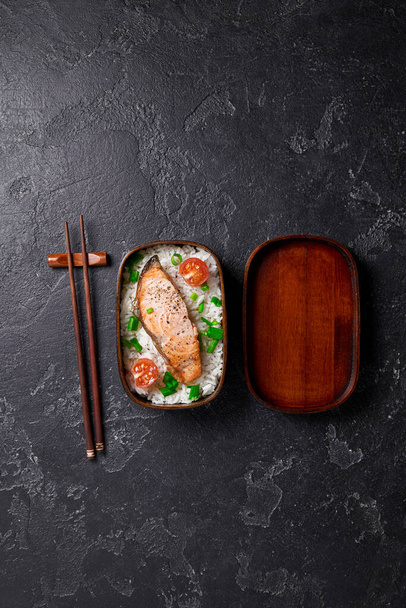 Bento box. Japanese packed lunch and chopsticks. - 写真・画像