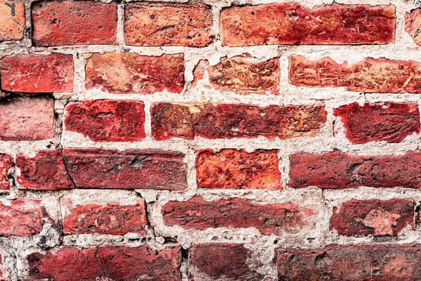 Textura envejecida de fondo de pared de ladrillo anaranjado y blanco manchado, bloques oxidados grumosos de tecnología de trabajo de piedra, arquitectura horizontal colorida
 - Foto, Imagen