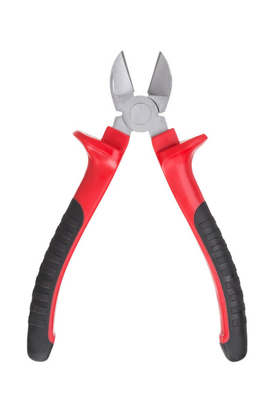 Opened diagonal pliers with rubber red handle isolated on a white background - Photo, Image
