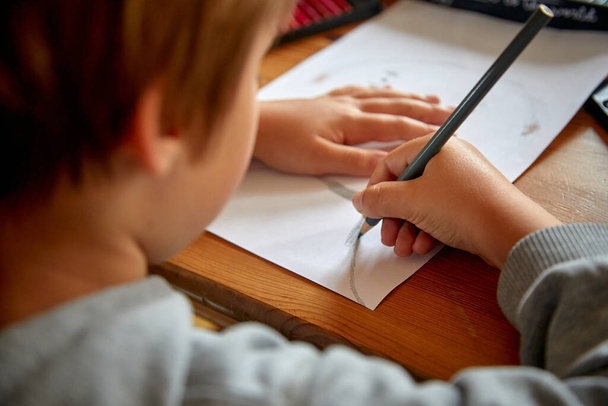 Boy girl painting drawing with colored pencils crayon - Fotó, kép