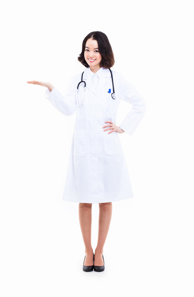 Young Asian woman doctor showing something - 写真・画像
