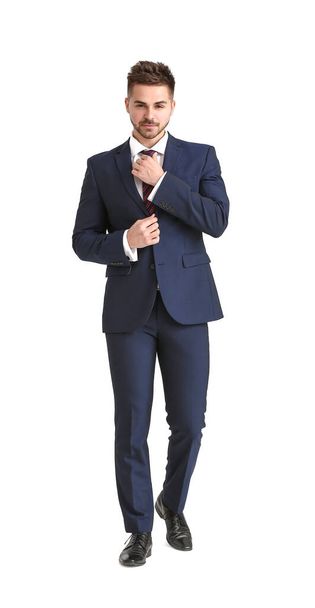 Handsome young man in elegant suit on white background - Zdjęcie, obraz