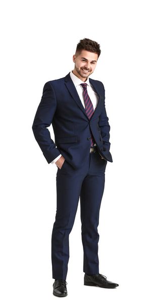 Handsome young man in elegant suit on white background - Foto, Imagen