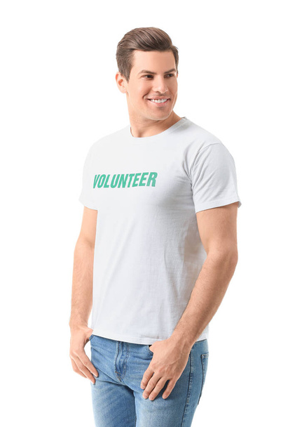 Handsome male volunteer on white background - Valokuva, kuva