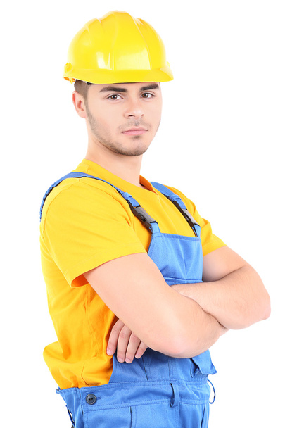 Male builder in yellow helmet isolated on white - Φωτογραφία, εικόνα