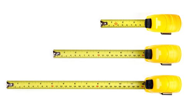 Yellow measuring tape isolated on white background, Top View. 4 in 8 in 12 in. - Photo, Image