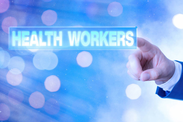 Γράμμα που δείχνει τους εργαζόμενους στην υγεία. Επιχειρηματική φωτογραφία που δείχνει ποιανού δουλειά είναι να προστατεύει την υγεία των κοινοτήτων τους. - Φωτογραφία, εικόνα