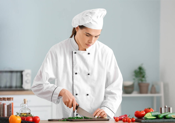 Transgender chef cooking in kitchen - Фото, зображення