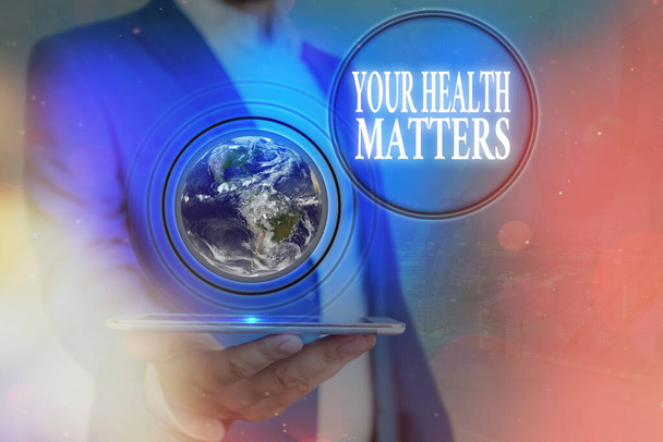 Käsiala teksti Your Health Matters. Käsite, joka tarkoittaa hyvää terveyttä, on tärkein muun muassa NASAn toimittaman kuvan elementit.
. - Valokuva, kuva