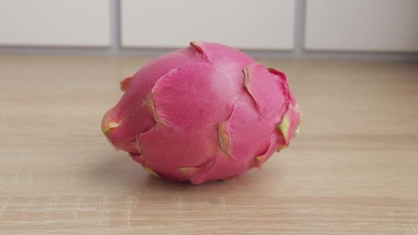 Taking Dragon Fruit From Bench - Footage, Video