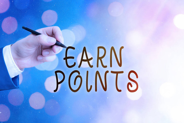 Conceptual hand writing showing Earn Points. Business photo text getting praise or approval for something you have done. - Photo, Image