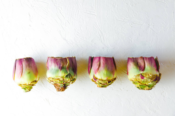 Fresh artichokes on white background, diet concept, healthy food. - Photo, Image