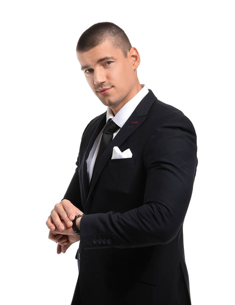 Handsome young man in elegant suit on white background - Photo, Image