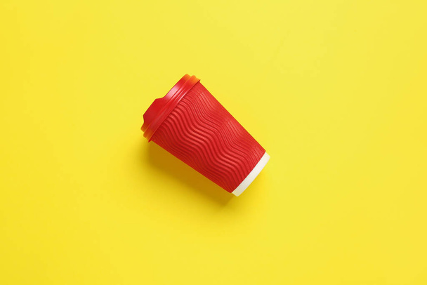 Takeaway cup for drink on color background - Fotoğraf, Görsel