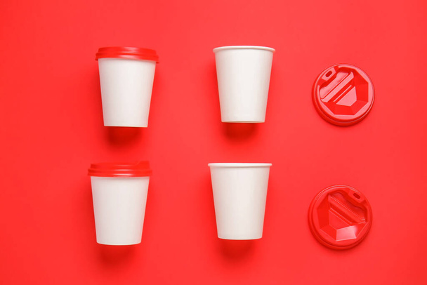Takeaway cups for drink on color background - Foto, Bild