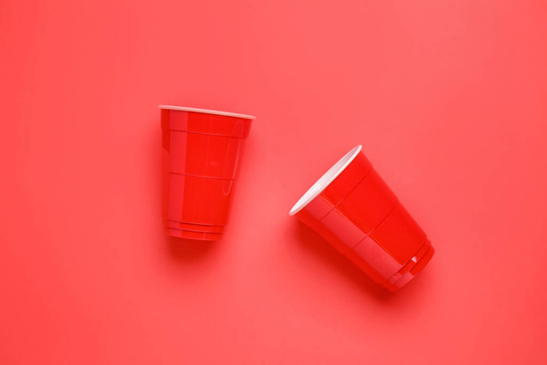 Takeaway cups for drink on color background - Valokuva, kuva