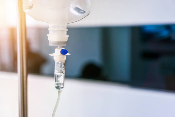 Close up of medical drip or IV drip chamber in patient room,Healthcare concept,  Selective focus. - Photo, Image