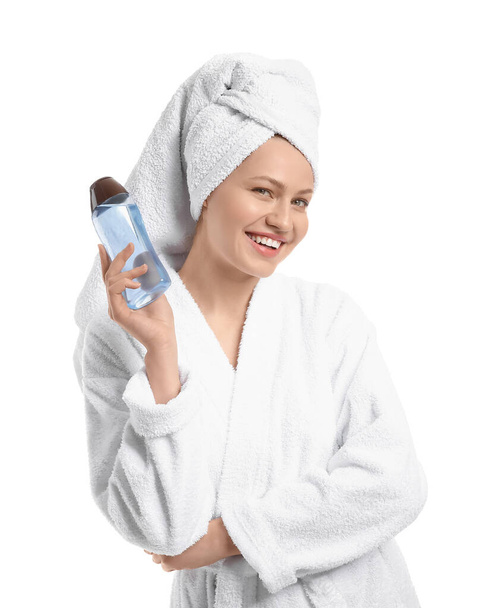 Gyönyörű fiatal nő zuhanyzóval gél fehér háttér - Fotó, kép