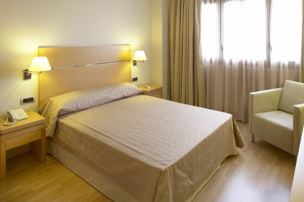 Hotel bedroom - Fotoğraf, Görsel