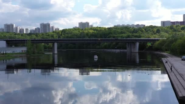 panoramic views of the river with a forest and reflection of clouds in the river taken from a drone - Filmmaterial, Video