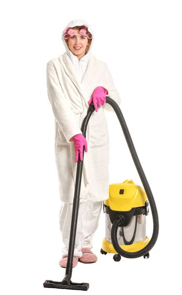 Housewife in protective costume and with vacuum cleaner on white background - Zdjęcie, obraz