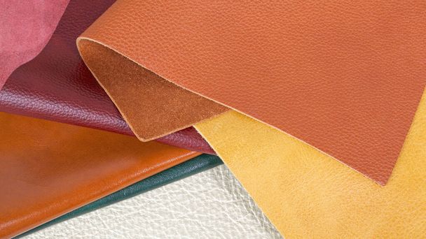 Different colors natural leather textures samples. Close-up shot  - Foto, afbeelding