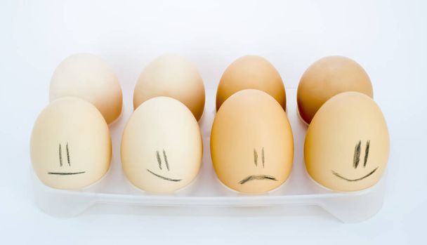 Eggs with emotions that bring a smile. - Foto, afbeelding