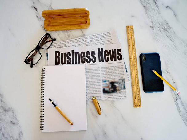 Business news, Newspaper on the table, morning coffee, finance news            - Foto, Imagem