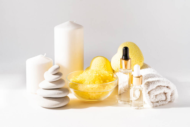 Premium Photo  Cozy spa composition of aroma of candles and bath towels,  soap. body care and hygiene concept.