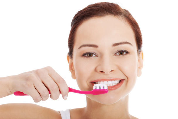 Young beautiful woman with toothbrush and paste. - Foto, imagen