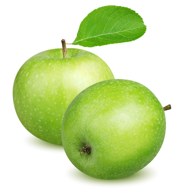 Manzanas verdes aisladas. Dos manzanas verdes enteras con hojas verdes aisladas sobre fondo blanco con ruta de recorte
 - Foto, Imagen