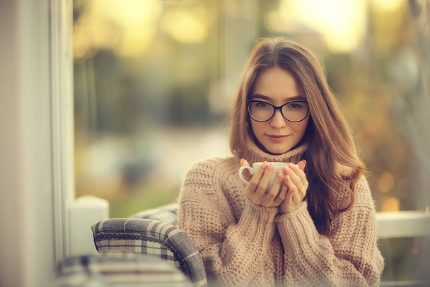 happy girl autumn cafe sweater concept vision model with glasses posing - Foto, Imagem